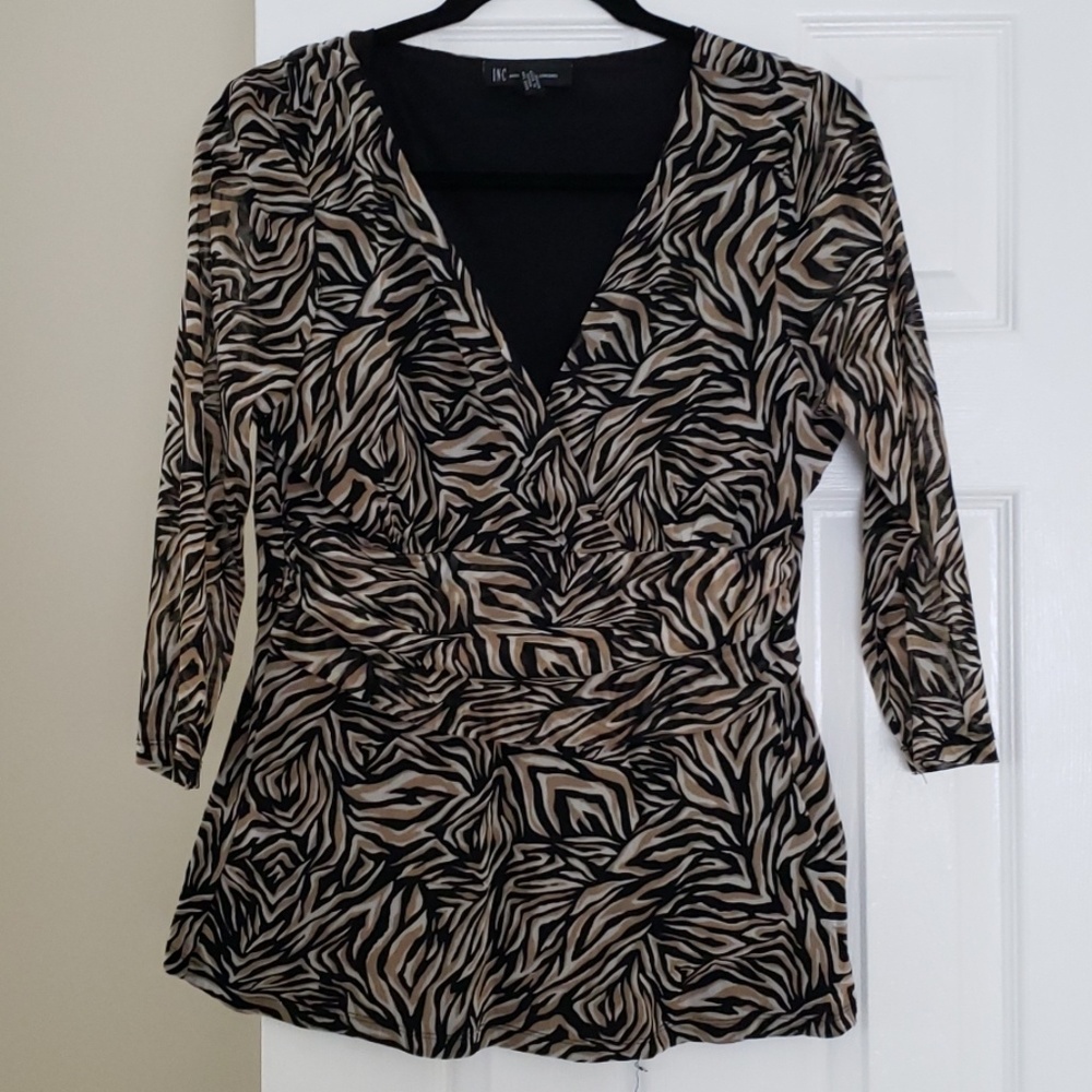 INC top in animal print Size XL.